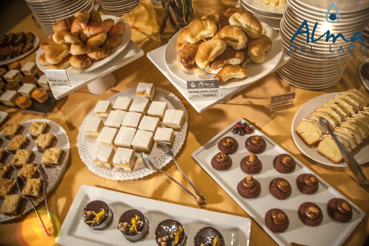 Alma Del Lago Suites & Spa San Carlos de Bariloche Exterior photo A selection of desserts